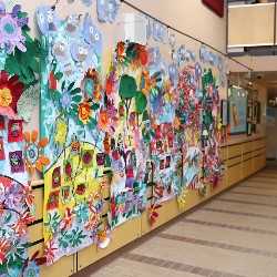 A wall of student art at TDVA.
